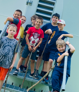 Royal Rangers at the base of a Wind Turbine